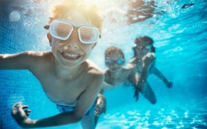 A group of children swimming underwater